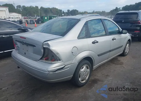 2002 Ford Focus Lx z USA, uszkodzony, nr VIN 1FAFP33P82W234702